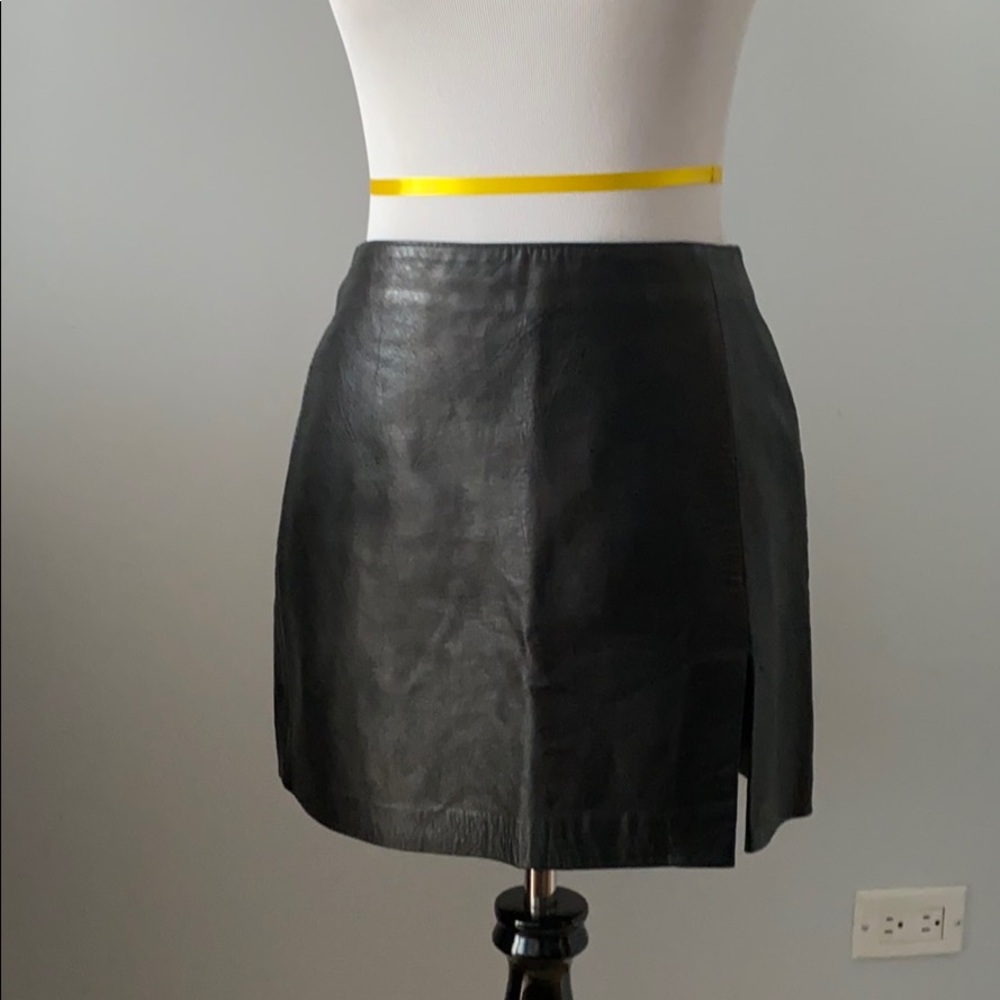 Black leather mini skirt